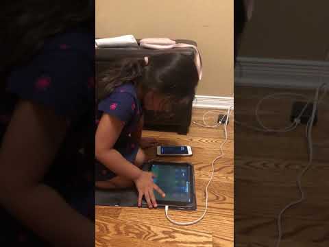 My little girl talking to Siri!!