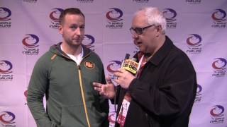 Morley Scott speaks with Edmonton Eskimo Sean Whyte at the Ford World Men's Curling Championship
