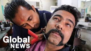 &#39;Hero&#39; Air Force pilot freed by Pakistan sparks moustache trend in India
