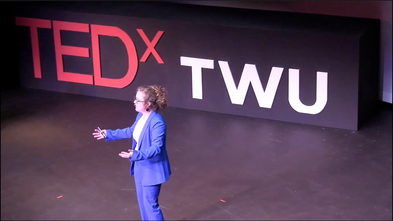 The hidden meaning behind your travel photos | Salena Parker | TEDxTWU