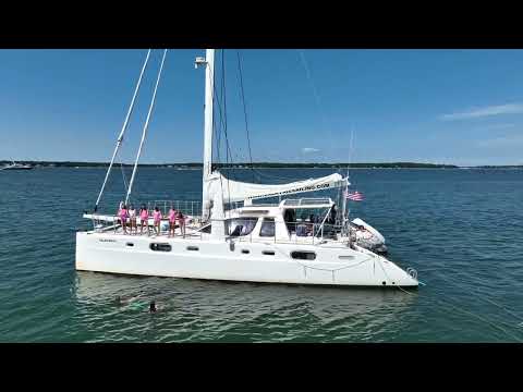 Yacht party during ultimate montauk Bachelorette party weekend. Swimming and jumping from charter boat
