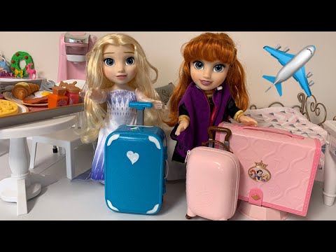 Elsa and Anna toddlers Packing for Vacation Disney Princess