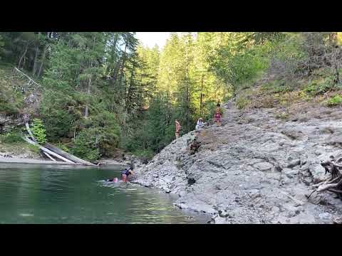 Jumping into the swimming hole. He was 14 here. The little one did not jump from the rocks.