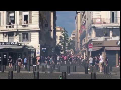 Russian Hooligans attacking England Supporters who try to flee before the match Russia   England