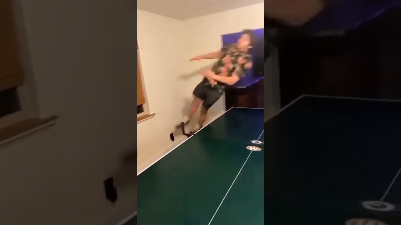 Guy Jumps on Table Tennis Table