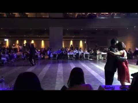  Lily Tan,    Gennysam Alcantara,    Ezequiel Gómez,    Agata Jargilo,    Sergiy Podbolotnyy,    and  Anna Chin  are  dancing  to  "  La Mariposa  "  by  Osvaldo Pugliese  at  Taipei Tango Festival  in  2016