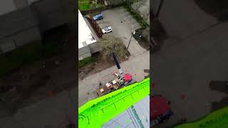 ABC Supply Crane Loading Shingles 6 Story Building