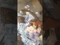 Snake vomiting money displays