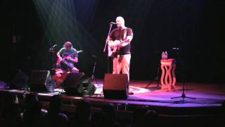 mike doughty down on the river by the sugar plant