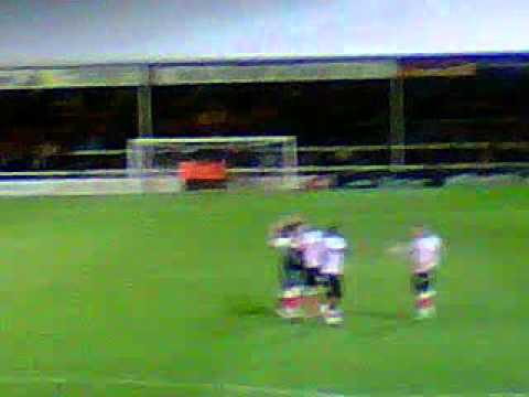 Saints fans singing at Peterborough while players celebrate win 17/04/12