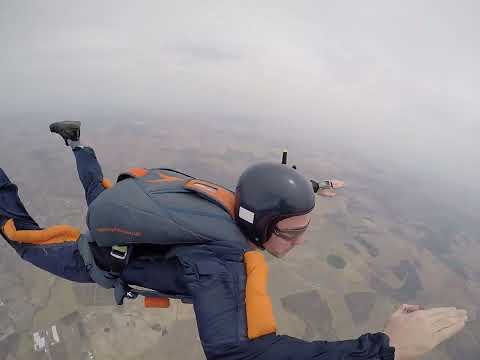 Oscar Skydiving and passing AFF Level 4.