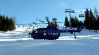 preview picture of video 'Rescue helicopter taking off from ski run'