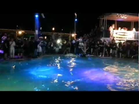 Jet ski backflips in a pool.