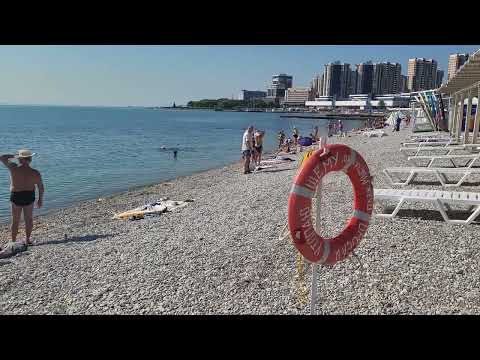 Wir sonnen uns mit meiner Frau am Strand