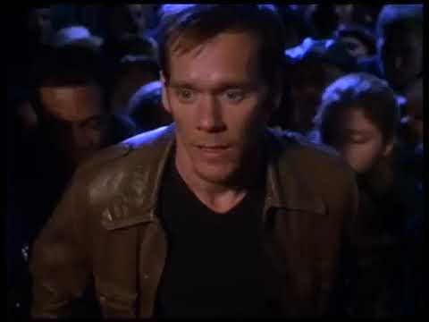 Stir of Echoes 1999 trailer frame with Kevin Bacon backlit in a Chicago alley