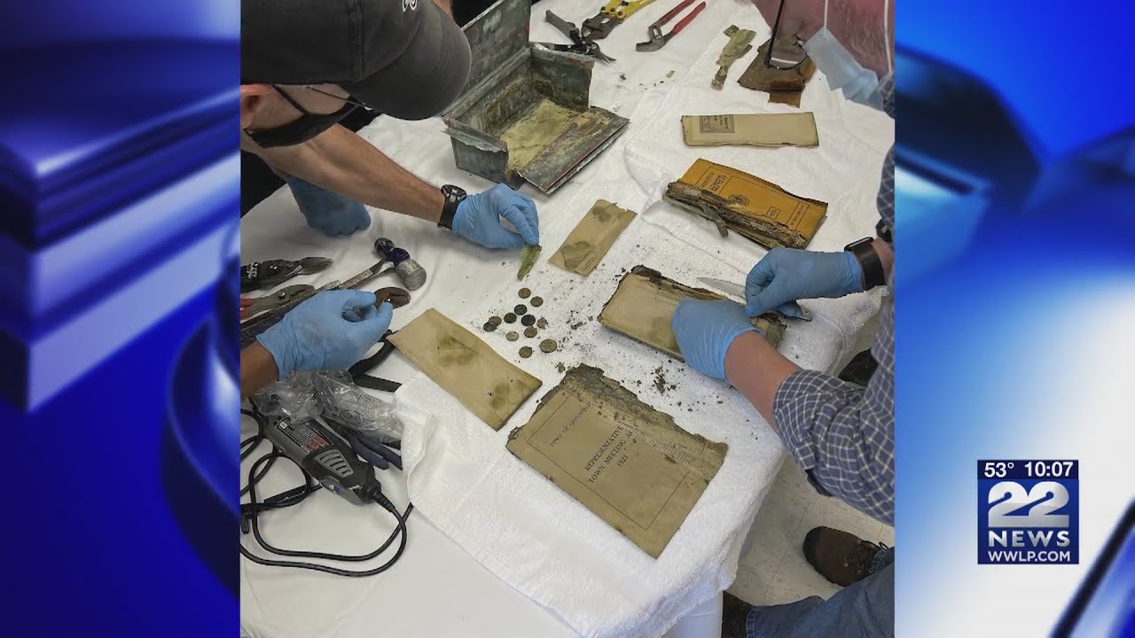Greenfield Fire Dept. open time capsule and find artifacts of the past