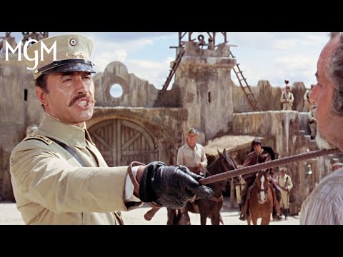 GUNS OF THE MAGNIFICENT SEVEN (1969) | Heads in the Sand | MGM