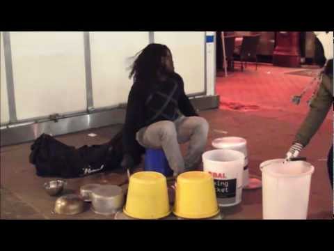 Street Drummer Playing Buckets, Pots and Pans. London Street Music.
