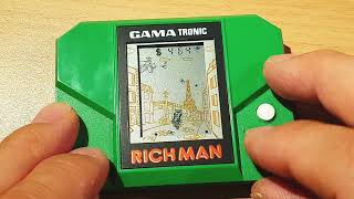 GAMA Tronic RICH MAN 1982 LCD Game