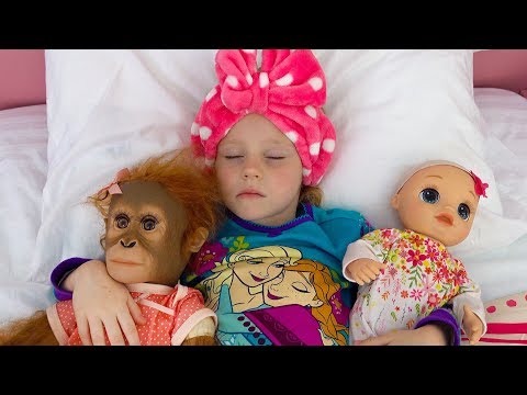 Nastya found a baby doll and pretends to be a parent