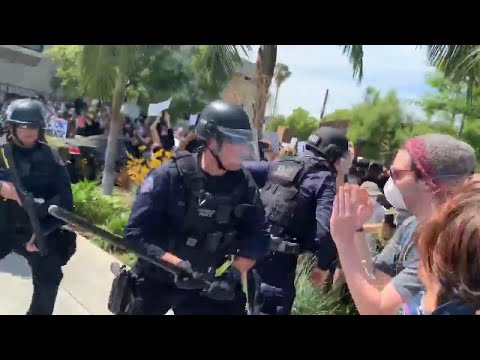 LAPD officer beats protesters with baton during George Floyd protest