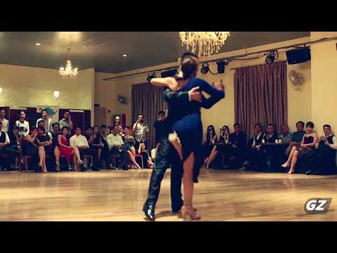  Javier Rodriguez  and  Moira Castellano  are  dancing  to  the  tango  "  El Olivo  "  by  Juan D'Arienzo  at  Guangzhou International Tango Festival  in  2019