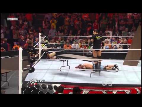 Randy Orton Throws Justin Gabriel On a Table