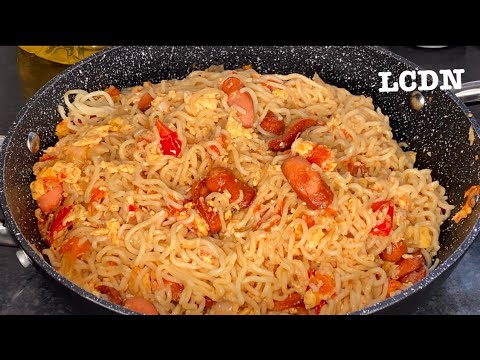 Stir-Fried Egg Noodles with Sausage and Tomatoes