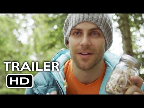 Trailer frame of the duo on a forest trail, Oregon mountains beyond