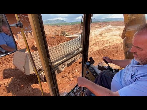 Caterpillar 245B Excavator Loading Mercedes & MAN Trucks - Operator View