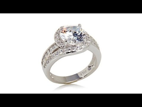 3.69ct Absolute Round with Baguette and Pav Sides Ring