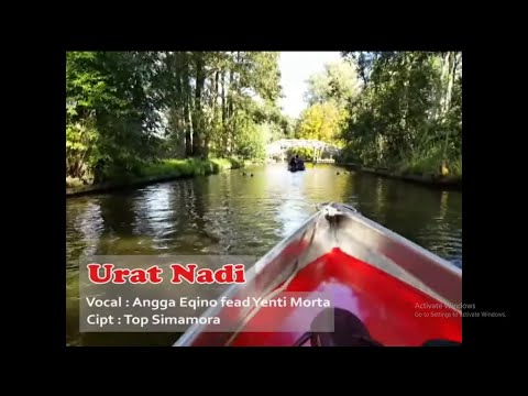 Lirik dan terjemahan lagu Tapsel ~ Angga Eqino feat Yenti Morta - Urat Nadi