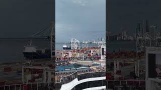 Party time at the MSC Seascape top pool deck with massive TV screen by drone #portmiami departure.