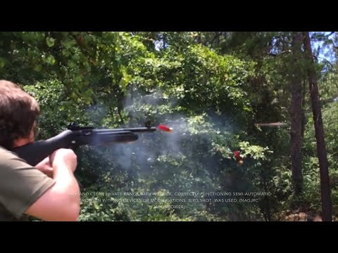 Me and a semi-auto shotgun shooting FASTER than most full autos with only my trigger finger.