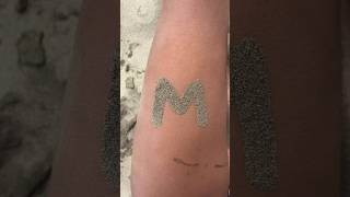 This girl made a tattoo on her foot with sand #shortsvideo
