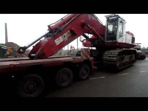 CATERPILLAR 375 ON TRANSPORT WITH MAN TGX 41.680 V8