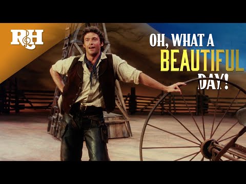 Thumbnail of the video: Hugh Jackman Sings "Oh, What a Beautiful Mornin'" (Official Lyric Video)
