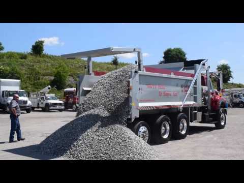 Hill International Trucks with Pik Rite Pusher Body