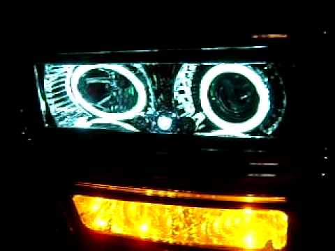 CLEAR CHROME PROJECTOR HEADLAMPS W/HALO 94-99 CHEVY/GMC TRUCKS. (WWW.CARiD.COM).