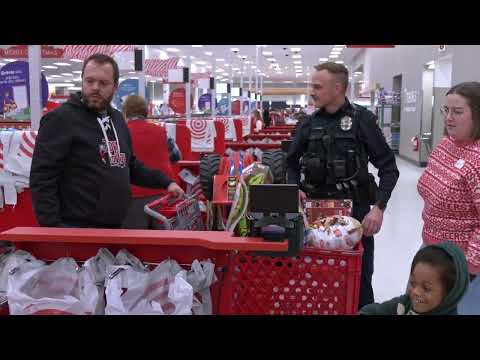 Kids 'Shop with a Cop' for Holiday Gifts