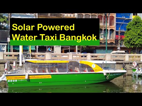 Solar electric powered taxi boat Bangkok. Electric boats on Phadung Krung Kasem Canal Bangkok.