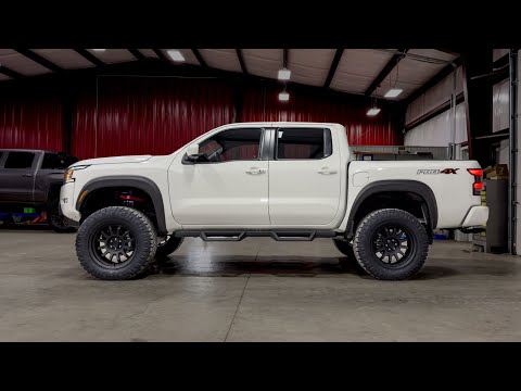 2024 Nissan Frontier pro4x with 6" Rough Country lift on 34s