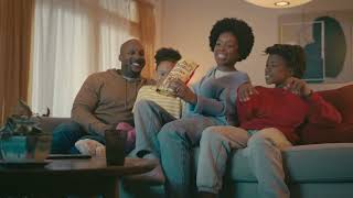  Mother gives a honey candy to her daughter