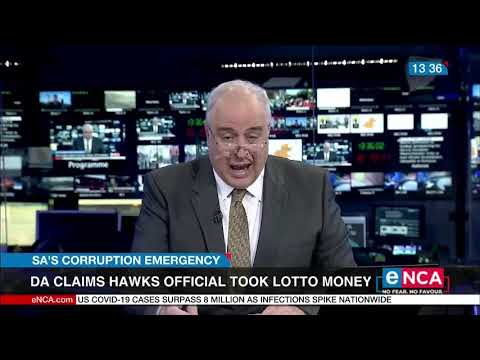 DA claims Hawks official took Lotto money
