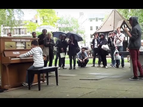 11 year old George Harliono plays Moonlight Sonata (3rd mov) on a Street Piano in the rain.
