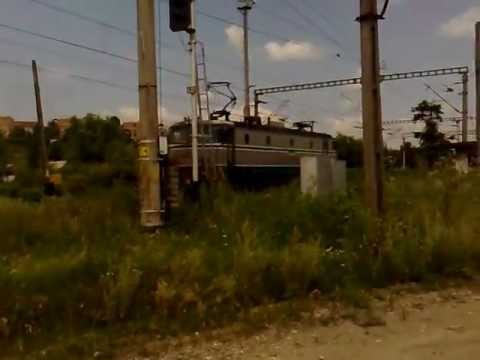 EA60 Locomotive passing near railroad crossing with speed