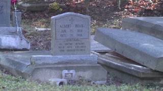 Coffins washed up by floodwaters