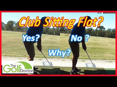 Should my irons sit flat on the ground at address in golf