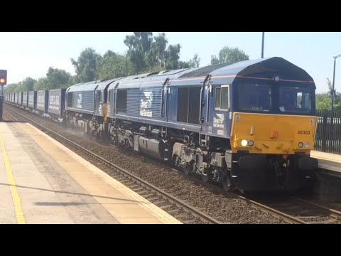 DRS 66303 leads 66426 passing Swinton with a Daventry DRS Tesco to Mossend Euroterminal