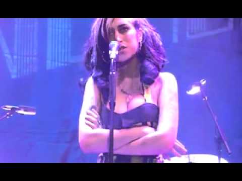 Amy Winehouse Falls Over, Forgets Words, And Mumbles Her First Performance Out Of Rehab
